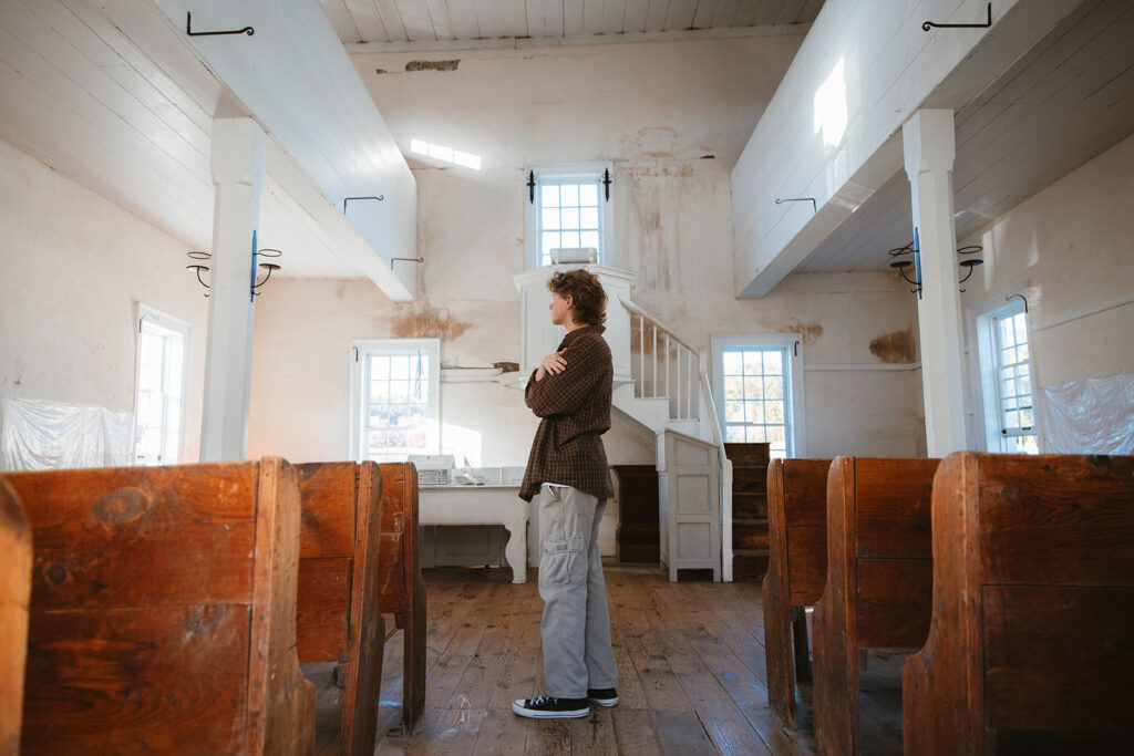 Senior Portrait inside of 1806 Old Log Church in Schellsburg, PA.